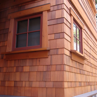 Custom cedar siding and exterior trim renovation in Guelph, Ontario